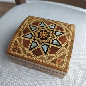 Intricate Wooden Jewelry Box with Geometric Design